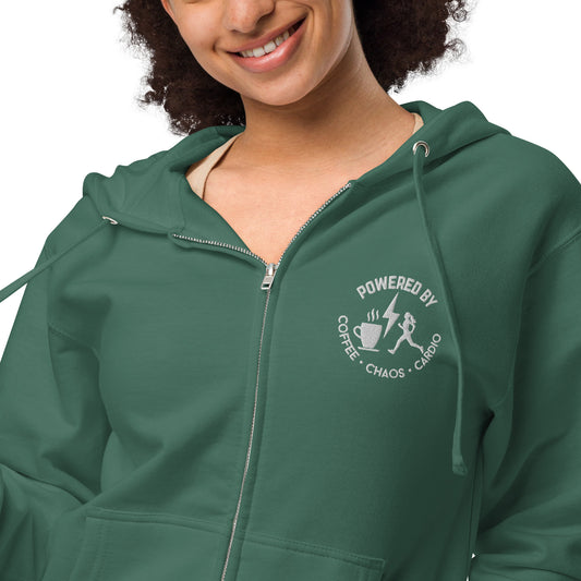 Alpine green fleece zip-up hoodie with white embroidered "Powered by Coffee Chaos & Cardio" text and graphic on chest.