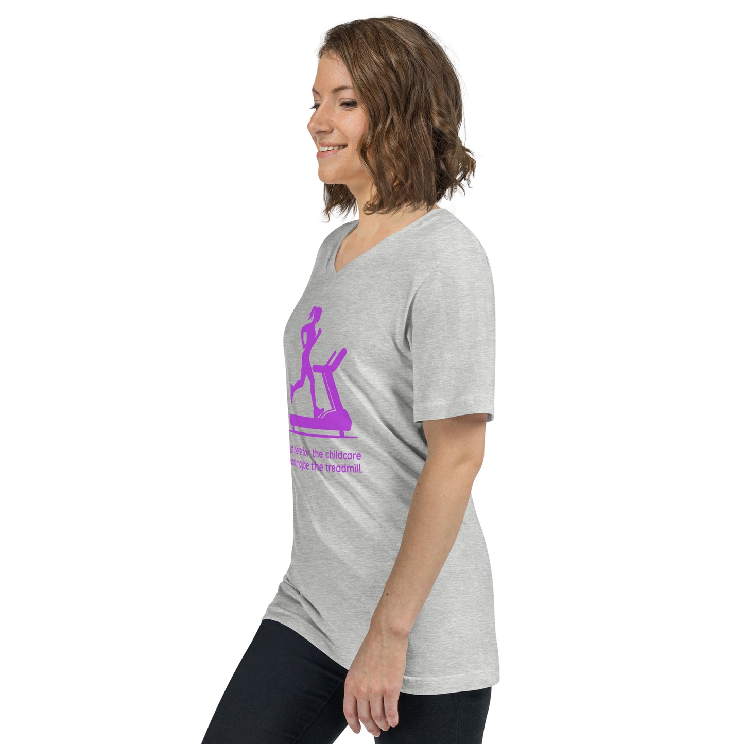 Athletic Heather V-neck tee with purple treadmill and child care graphic, worn by smiling woman in profile, short sleeves.