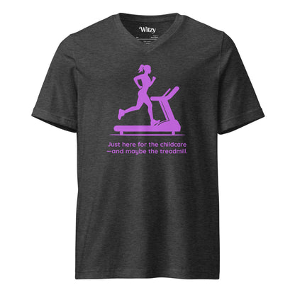 Dark grey heather V-neck tee with pink graphic of woman on treadmill and text "Just here for the childcare—and maybe the.