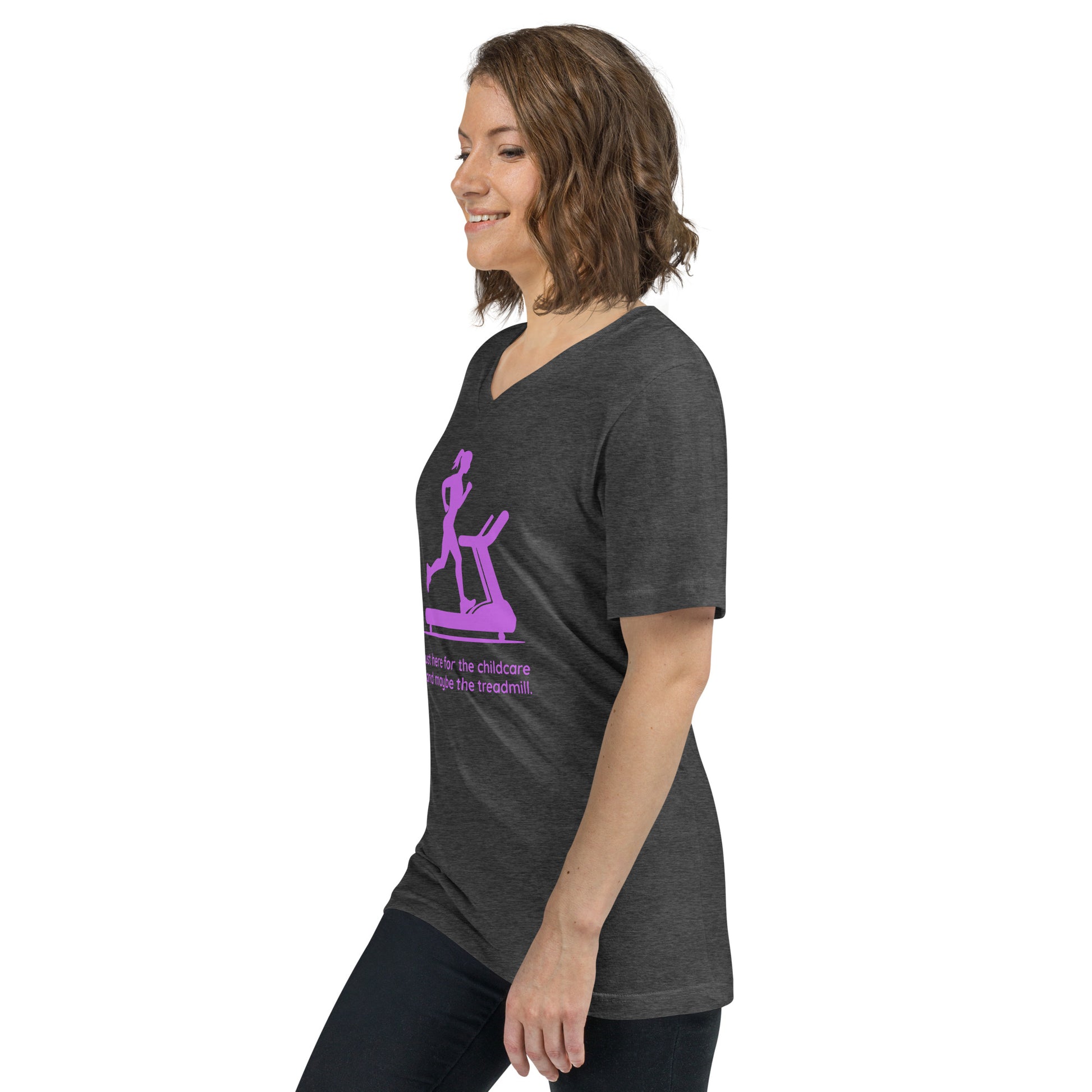 Dark grey heather V-neck tee with pink childcare and treadmill graphic, worn by smiling woman.