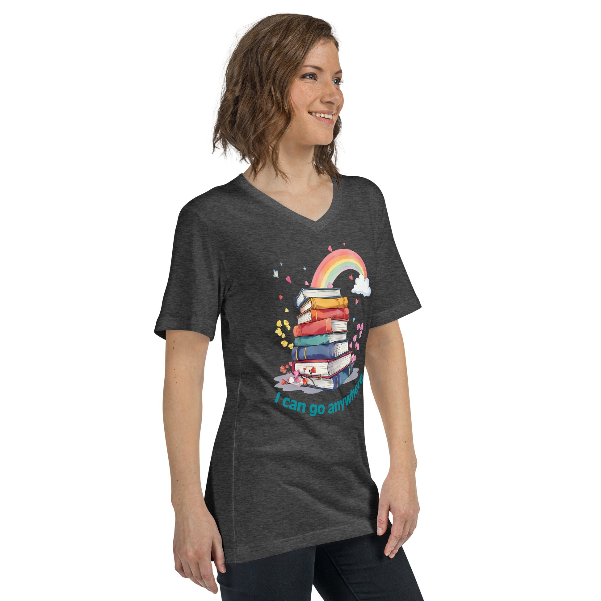 Charcoal gray unisex V-neck tee with colorful stacked books and rainbow graphic, "I can go anywhere" text.
