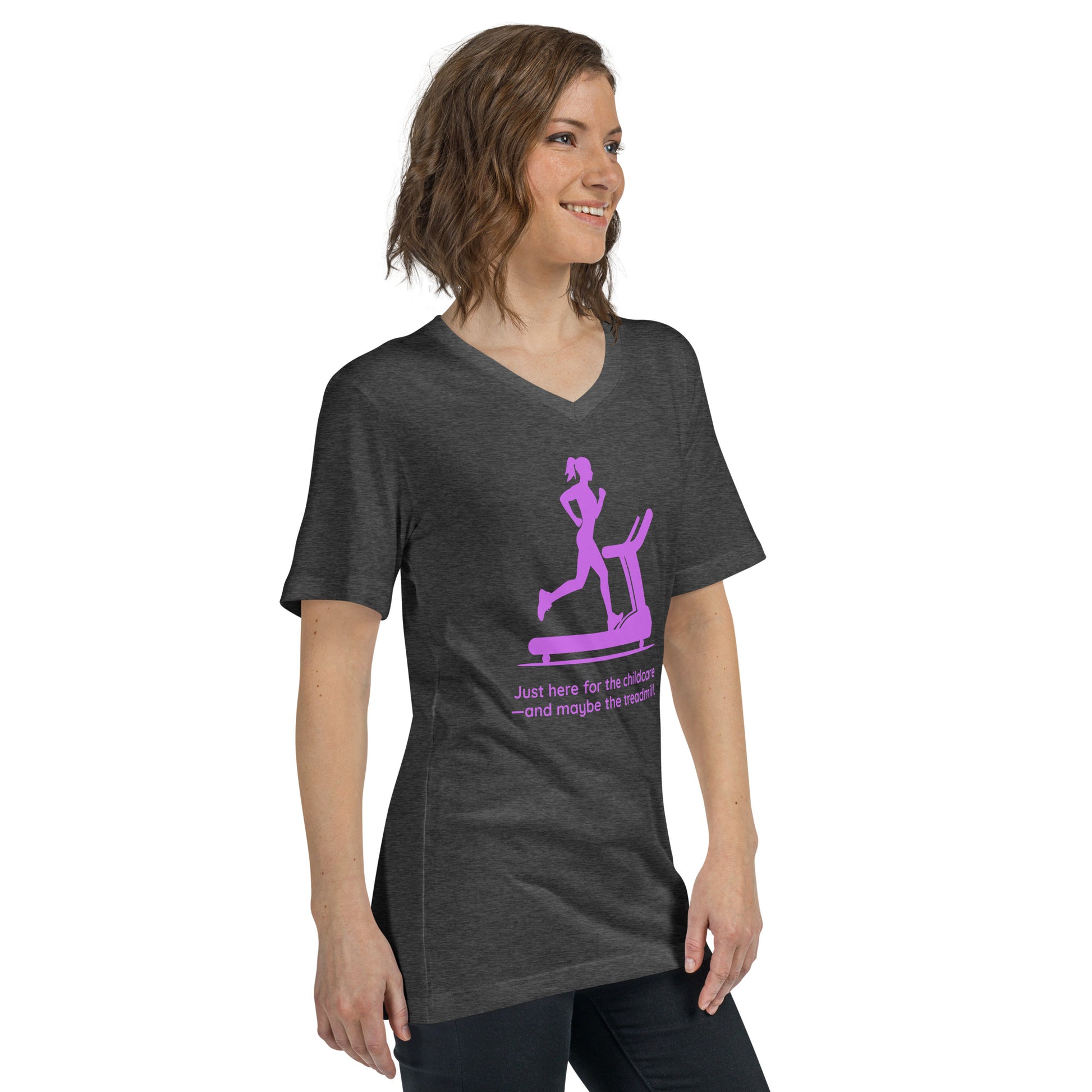 Dark grey heather V-neck tee with pink treadmill graphic and humorous childcare text worn by smiling woman.