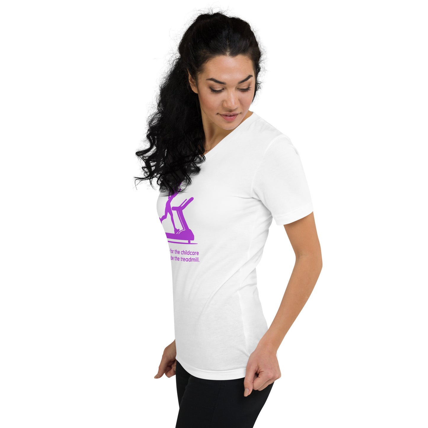 White V-neck tee with purple "Just Here for the Childcare—and Maybe the Treadmill" text and graphic, worn by woman.