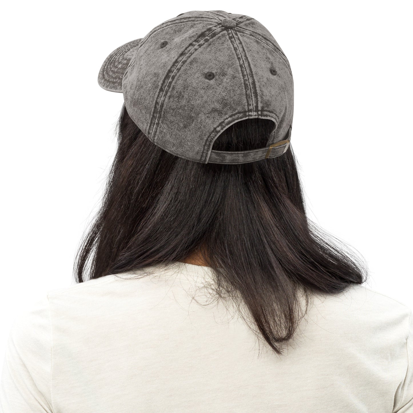 Charcoal grey vintage cotton twill cap with adjustable strap, worn from back.