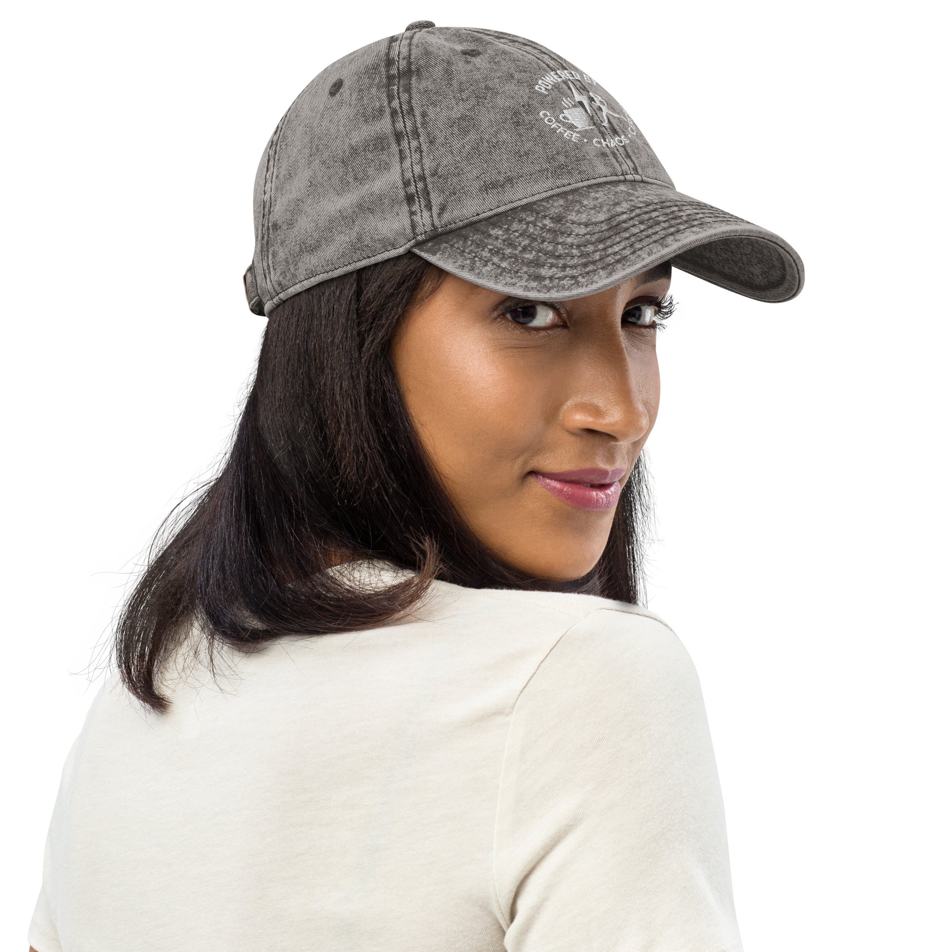 Charcoal grey vintage cotton twill cap with white embroidered "Powered by Coffee, Chaos & Cardio" text.
