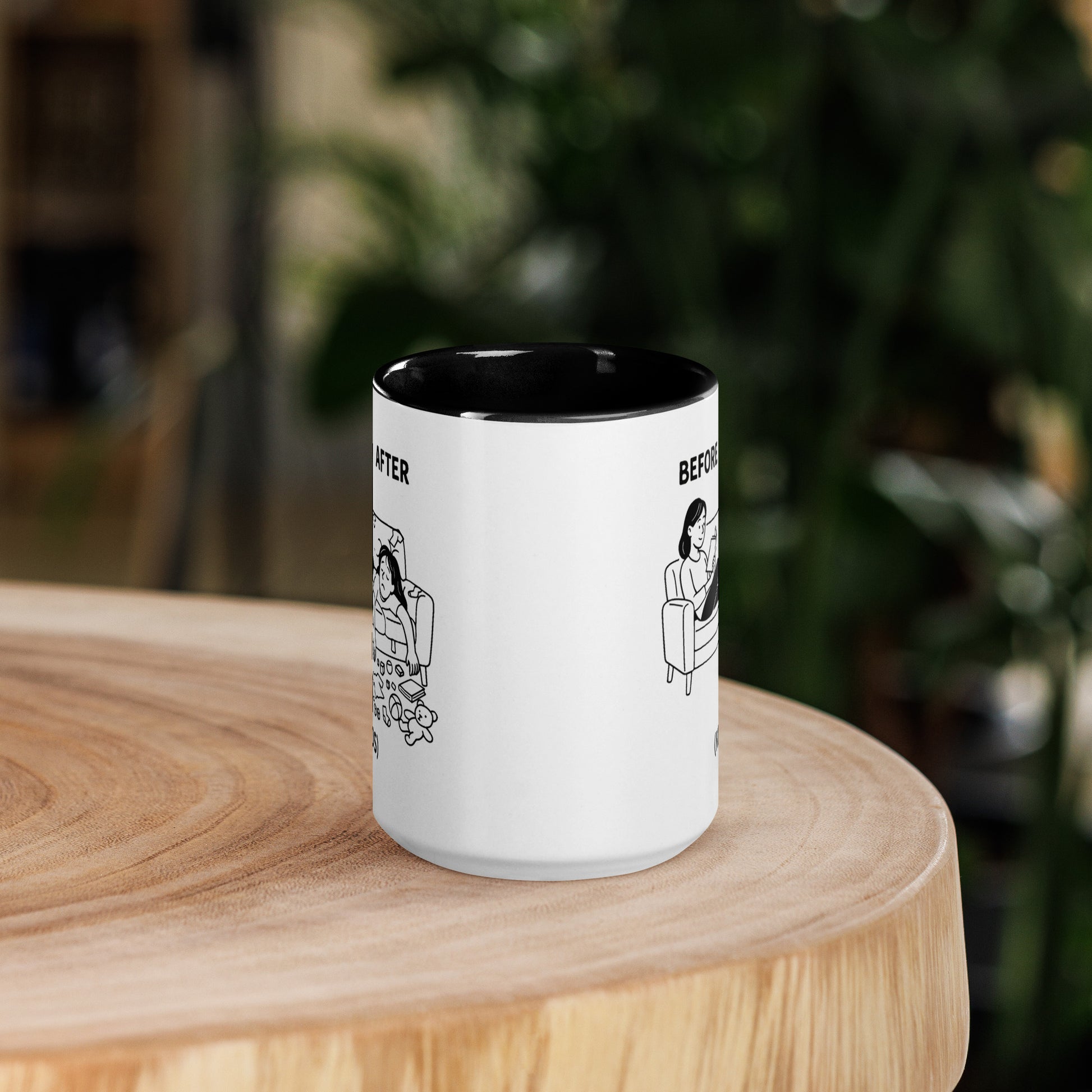 White mug with black interior and black handle on a wooden surface with a blurred background